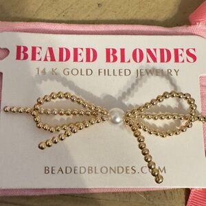 Beaded Blondes bow gold pearl bracelet standard size 6.75 inch. Brand new